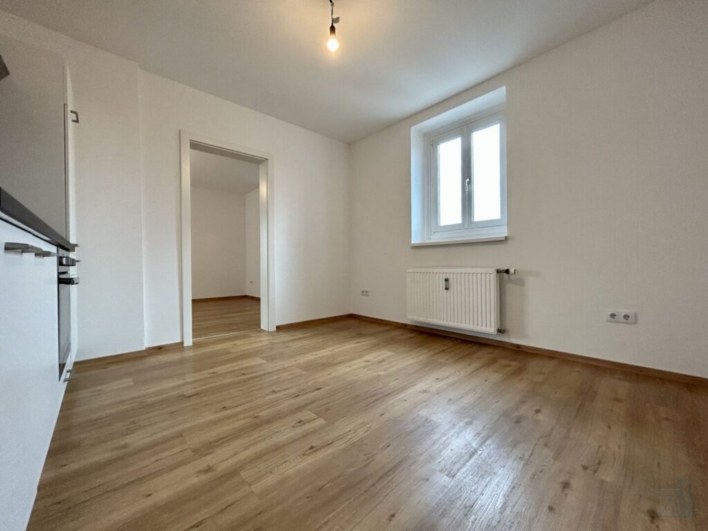 Sonnige 38 m² Eck-Dachgeschosswohnung mit separater Küche in Graz-Puntigam – Bild 3